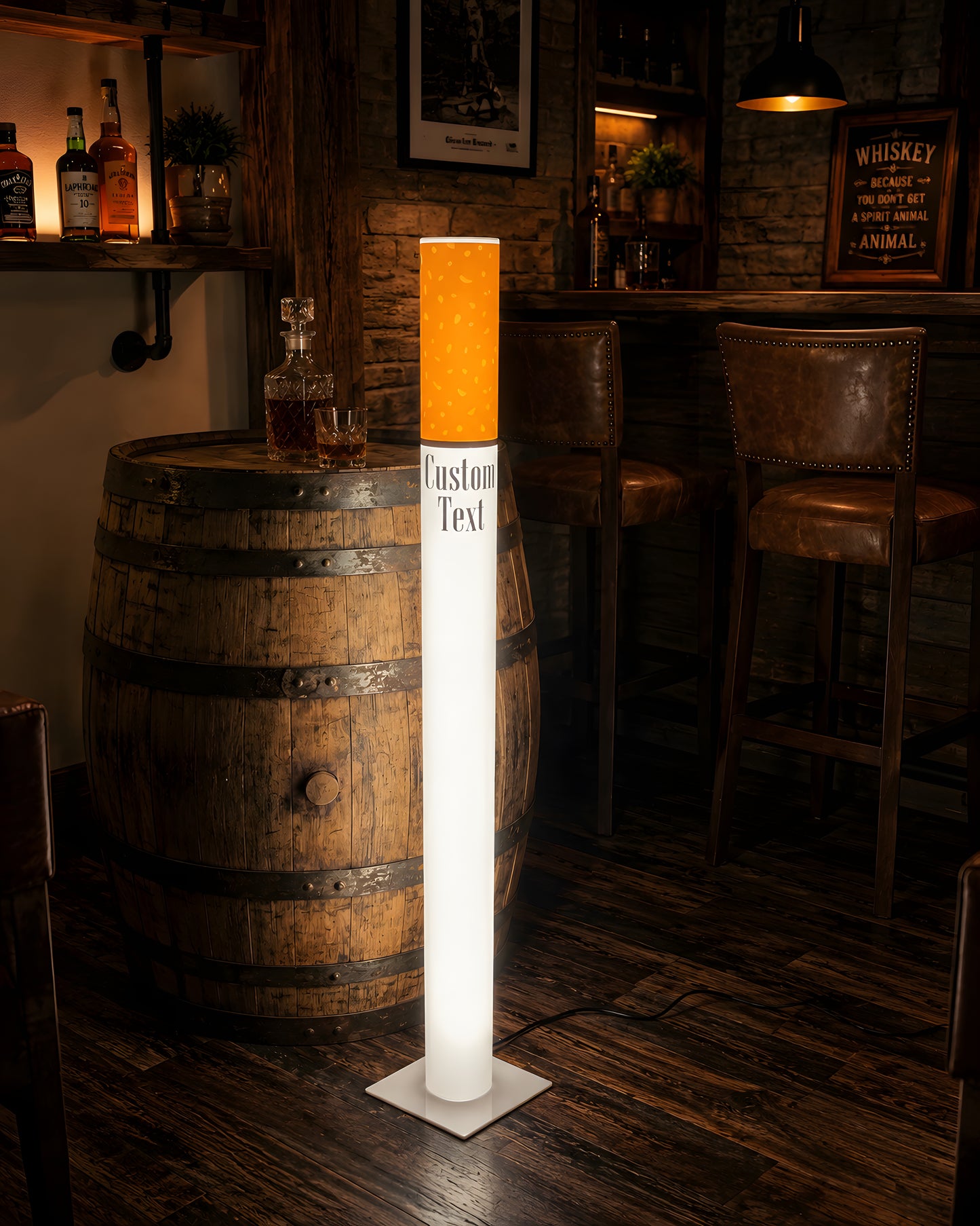 Retro giant cigarette floor lamp beside an oak whiskey barrel in a rustic home bar with leather bar stools and bottle shelves