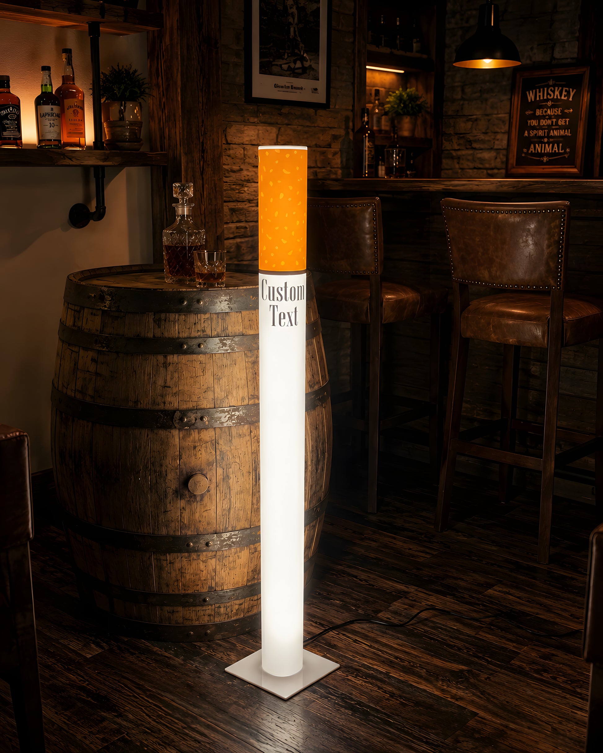 Retro giant cigarette floor lamp beside an oak whiskey barrel in a rustic home bar with leather bar stools and bottle shelves